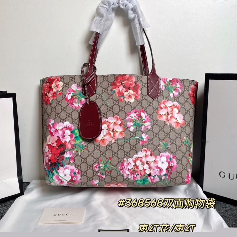 G*u*i shopping bags